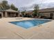 Inviting community pool with surrounding patio and lounge chairs at 846 N Pueblo Dr # 126, Casa Grande, AZ 85122