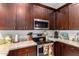 Well-equipped kitchen with ample cabinetry and modern appliances at 846 N Pueblo Dr # 126, Casa Grande, AZ 85122