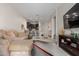 Open living room with kitchen view, neutral decor and plush seating at 846 N Pueblo Dr # 126, Casa Grande, AZ 85122