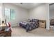 Bright bedroom with a double bed, window, and workspace at 846 N Pueblo Dr # 126, Casa Grande, AZ 85122