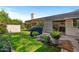 Landscaped backyard with patio and grill at 6516 E Maverick Rd, Paradise Valley, AZ 85253