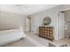 Bedroom with dresser and access to a bathroom at 6516 E Maverick Rd, Paradise Valley, AZ 85253