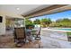 Covered patio overlooking the pool and backyard at 6516 E Maverick Rd, Paradise Valley, AZ 85253