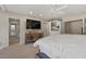 Main bedroom features a large bed, built-in shelving and ensuite bathroom access at 6516 E Maverick Rd, Paradise Valley, AZ 85253