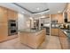 Gourmet kitchen with stainless steel appliances and granite island at 6516 E Maverick Rd, Paradise Valley, AZ 85253