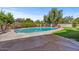 Inviting kidney-shaped pool with flagstone decking at 6516 E Maverick Rd, Paradise Valley, AZ 85253