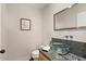 Modern bathroom with glass sink, granite countertop, and updated fixtures at 6516 E Maverick Rd, Paradise Valley, AZ 85253
