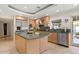 Well-equipped kitchen with stainless steel appliances and an island at 6516 E Maverick Rd, Paradise Valley, AZ 85253
