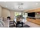 Relaxing Gathering room with a fireplace, TV, and pool view at 6516 E Maverick Rd, Paradise Valley, AZ 85253