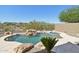 Inviting pool with a waterfall feature and spa at 2140 W Clearview Trl, Anthem, AZ 85086