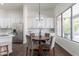 Kitchen with breakfast nook and stainless steel appliances at 2820 E Ranch Ct, Gilbert, AZ 85296