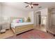 Main bedroom with ensuite bathroom access and ceiling fan at 183 W Evergreen Pear Ave, Queen Creek, AZ 85140