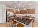 Kitchen boasts stainless steel appliances and ample cabinetry at 183 W Evergreen Pear Ave, Queen Creek, AZ 85140