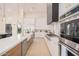 Bright kitchen with stainless steel appliances and white cabinetry at 5223 W Encanto Verde --, San Tan Valley, AZ 85144