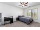 Small bedroom with a desk and a bed at 7640 E Snowdon Cir, Mesa, AZ 85207