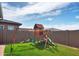 Playset and grassy area in backyard at 10020 E Strobe Ave, Mesa, AZ 85212