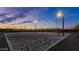 Well-lit outdoor sand volleyball court at night at 10020 E Strobe Ave, Mesa, AZ 85212