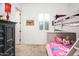 bedroom with bunk bed, dresser, and window at 10020 E Strobe Ave, Mesa, AZ 85212