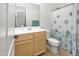Bathroom with shower/tub combo, vanity, and tile floor at 10020 E Strobe Ave, Mesa, AZ 85212