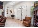 Bright entryway with a view of the front door and living area at 10020 E Strobe Ave, Mesa, AZ 85212