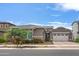 Beautiful two-story home with a two-car garage and well-maintained landscaping at 10020 E Strobe Ave, Mesa, AZ 85212