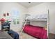 bedroom with bunk bed and window at 10020 E Strobe Ave, Mesa, AZ 85212