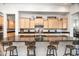 Modern kitchen with ample counter space, light wood cabinets, and a granite island at 10020 E Strobe Ave, Mesa, AZ 85212