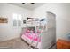 bedroom with bunk beds and playful decor at 10020 E Strobe Ave, Mesa, AZ 85212