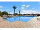Large community pool with surrounding lounge chairs at 8865 E Baseline Rd # 753, Mesa, AZ 85209