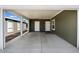 Covered carport with two access doors and concrete flooring at 8865 E Baseline Rd # 753, Mesa, AZ 85209