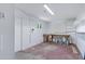 Workshop area with workbench, shelves, and storage at 6027 E Duncan St, Mesa, AZ 85205