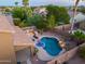 Aerial view of house, pool, and backyard oasis at 44449 W Canyon Creek Dr, Maricopa, AZ 85139