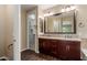 Bathroom with double vanity and walk-in shower at 3432 E Strawberry Dr, Gilbert, AZ 85298