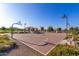 Well-maintained basketball court with seating and nearby playground at 3432 E Strawberry Dr, Gilbert, AZ 85298