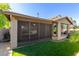 Screened patio with view of the lawn at 3432 E Strawberry Dr, Gilbert, AZ 85298
