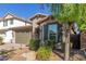 One-story home with a two-car garage and landscaped front yard at 3432 E Strawberry Dr, Gilbert, AZ 85298