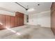 Garage with ample storage and interior access at 3432 E Strawberry Dr, Gilbert, AZ 85298