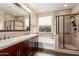 Spa-like bathroom with soaking tub and double vanity at 3432 E Strawberry Dr, Gilbert, AZ 85298