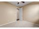 Spacious bedroom with neutral walls and carpet at 3432 E Strawberry Dr, Gilbert, AZ 85298