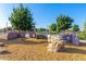 Unique playground with rock climbing features and shaded areas at 3432 E Strawberry Dr, Gilbert, AZ 85298