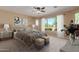 Bright bedroom with large windows and ceiling fan at 3432 E Strawberry Dr, Gilbert, AZ 85298