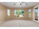 Spacious bedroom with large windows and patio access at 3432 E Strawberry Dr, Gilbert, AZ 85298