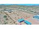 Aerial view showcasing a house and expansive lot in a desert setting at 19999 W Fawny Ln, Casa Grande, AZ 85122