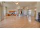Open concept kitchen with island, stainless steel appliances, and light wood cabinets at 19999 W Fawny Ln, Casa Grande, AZ 85122