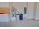 Garage with water heater and storage cabinets at 19999 W Fawny Ln, Casa Grande, AZ 85122