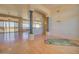 Bright dining room with hardwood floors and a view to the kitchen at 19999 W Fawny Ln, Casa Grande, AZ 85122