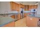 Kitchen with stainless steel appliances and a large island at 19999 W Fawny Ln, Casa Grande, AZ 85122
