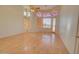 Bright and spacious bedroom with hardwood floors and large windows at 19999 W Fawny Ln, Casa Grande, AZ 85122
