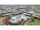 Aerial view of community pool, tennis courts, and clubhouse at 10348 E Tupelo Ave, Mesa, AZ 85212