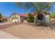 House exterior showcasing a red tile roof and desert landscaping at 15316 W Sky Hawk Dr, Sun City West, AZ 85375